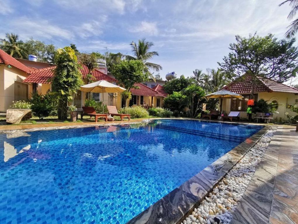Sun & Wind Paradise Bungalow Дуонг-Донг Экстерьер фото